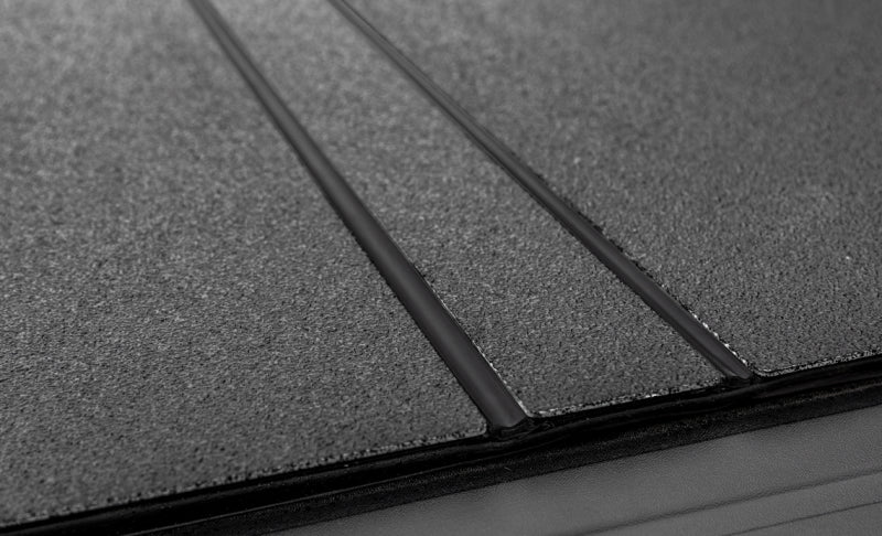 Access LOMAX Tri-Fold Cover Black Urethane Finish 15+ Chevrolet Colorado/GMC Canyon - 5ft Bed - Eastern Shore Retros